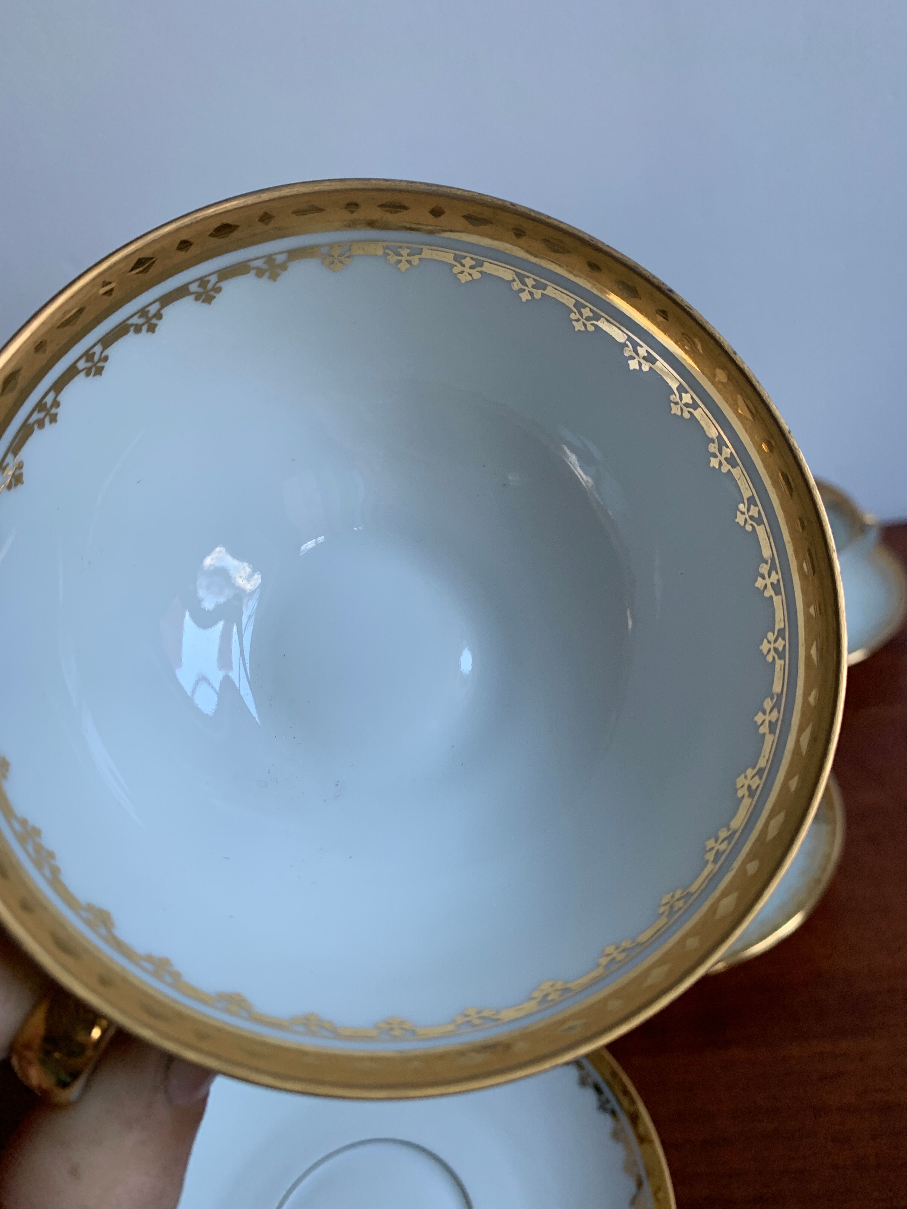 6 cups and golden porcelain saucers