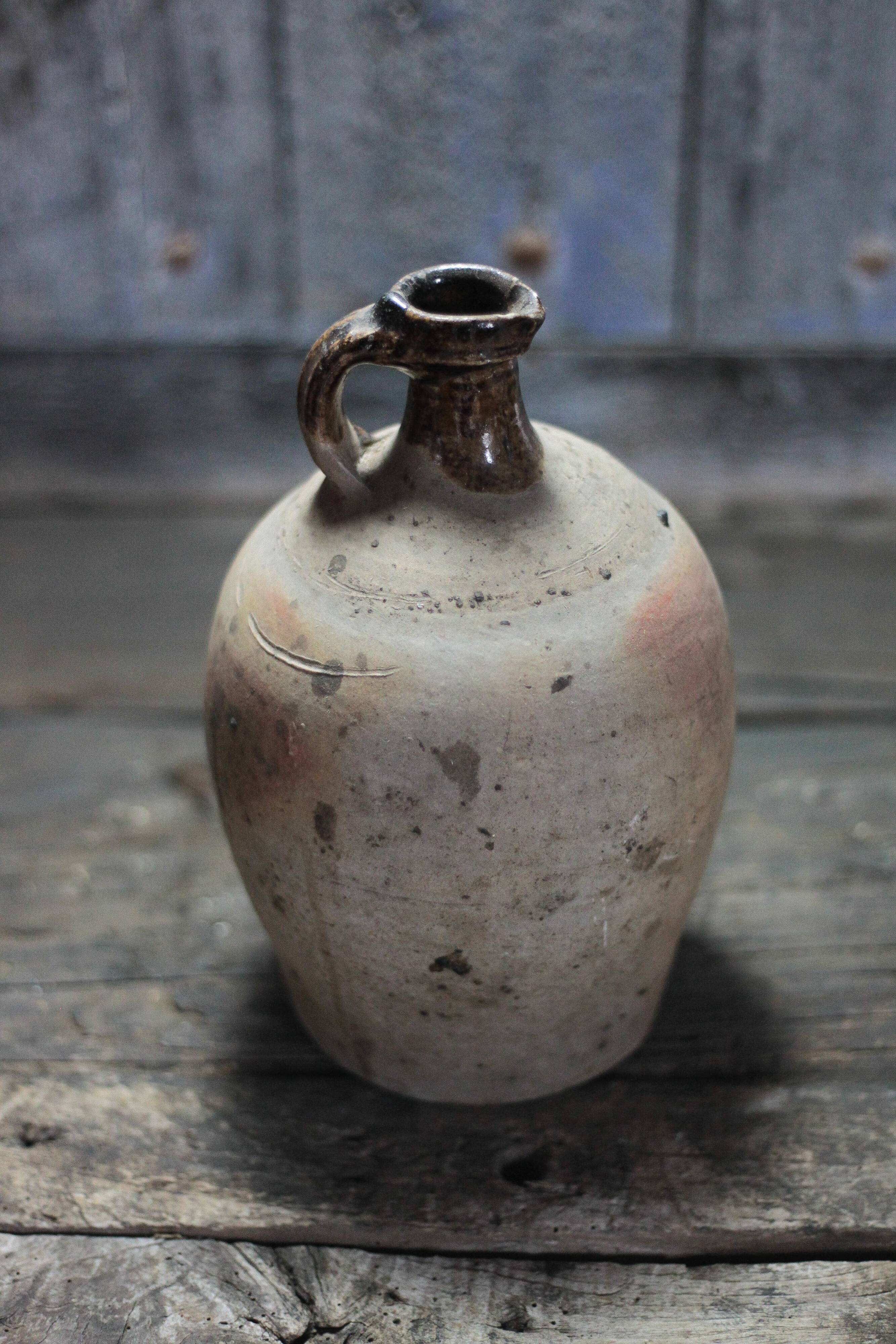Antique handled pot, antique pot, handled jar, interior decoration.