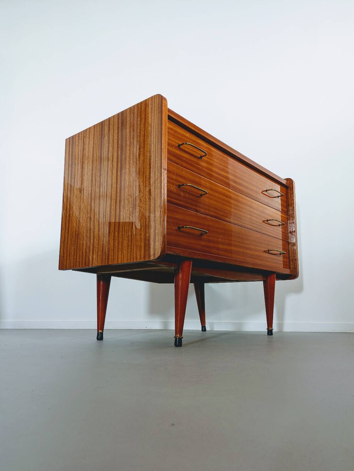 Vintage wooden chest of drawers in Scandinavian style