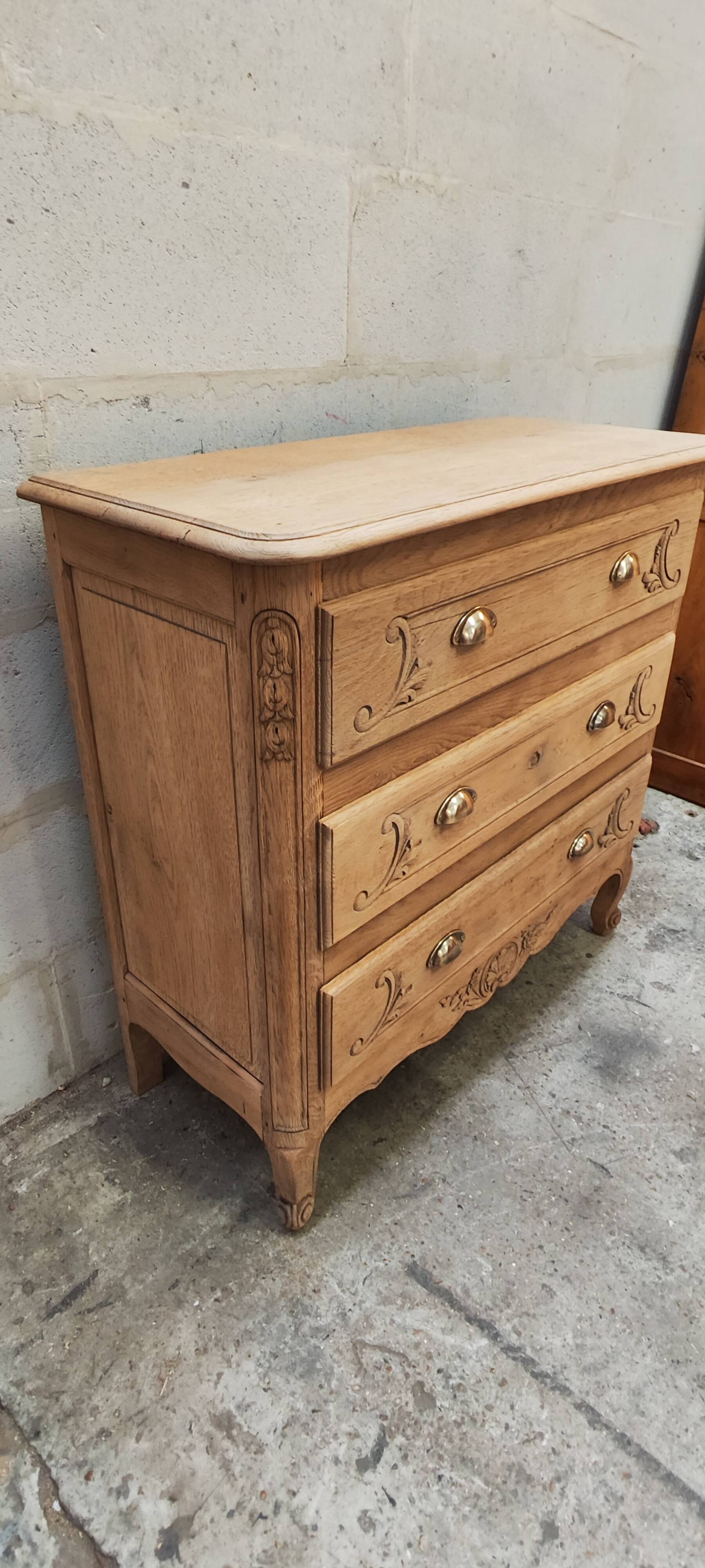 Old chest of drawers with three drawers in raw solid oak
