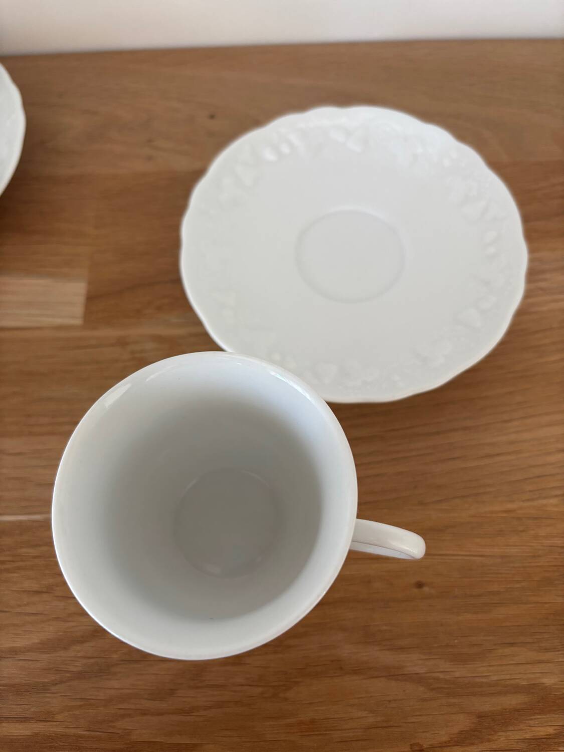 5 cups, 4 saucers and a creamer in Philippe Deshoulières porcelain