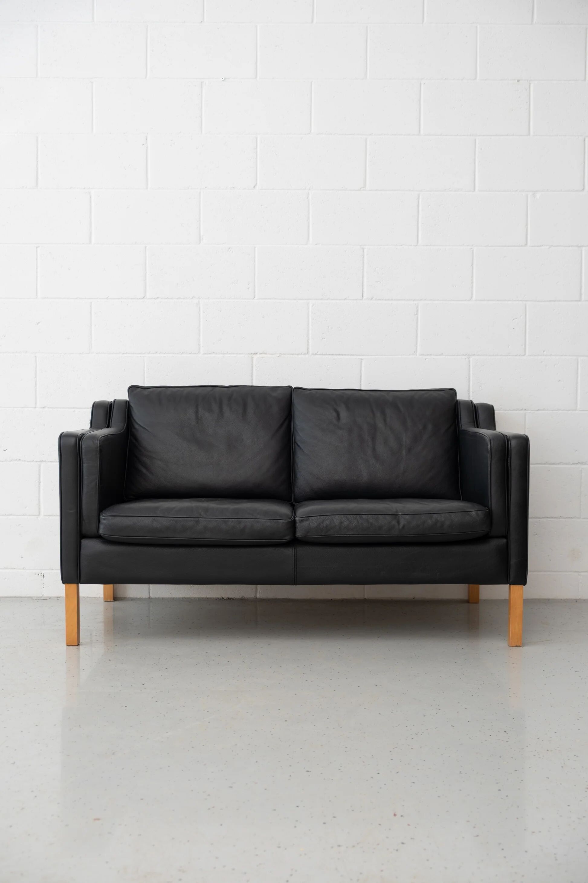 Stouby black leather sofa