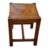 Oak stool seated in straw