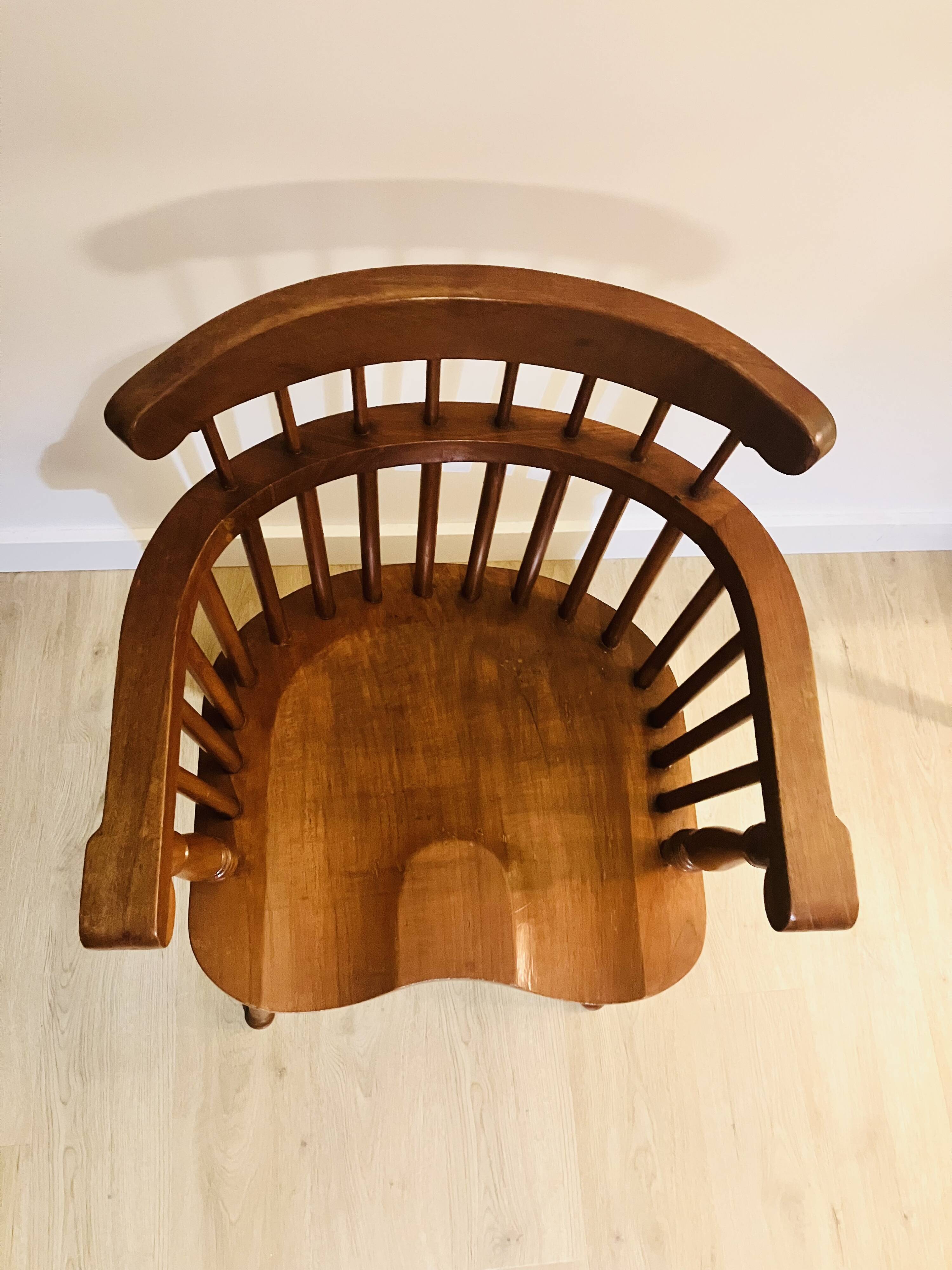 Solid wood chair with armrests
