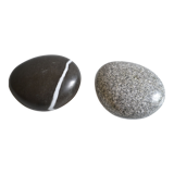 2 boxes in lithographed sheet metal in the shape of a pebble