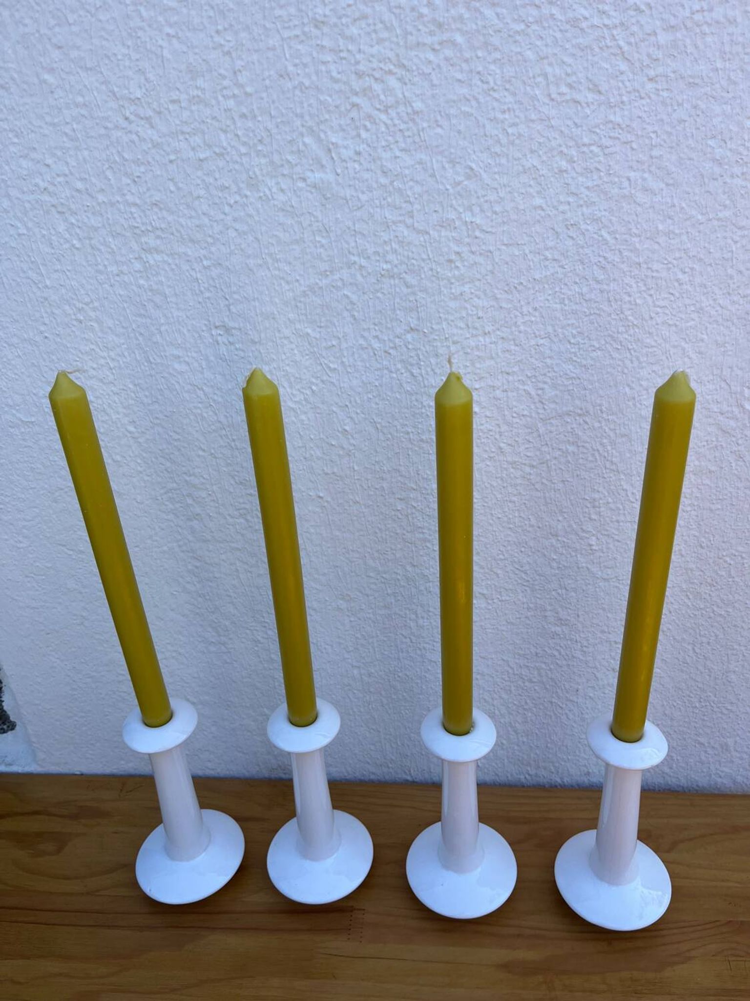 Set of 4 white ceramic candle holders