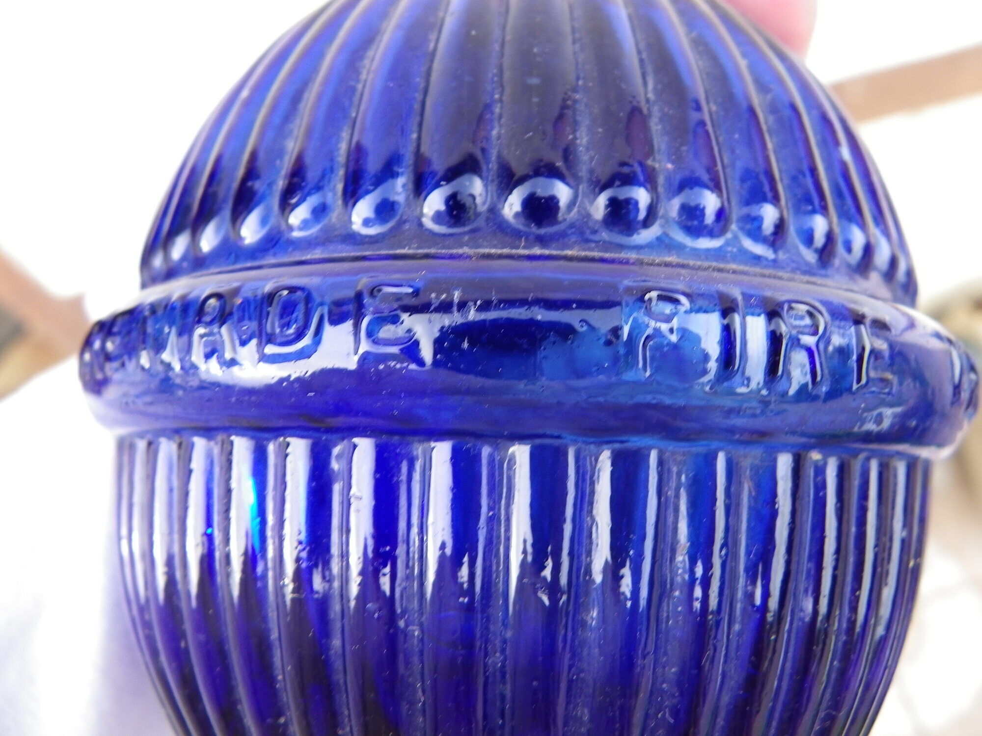 HARDEN fireplace fire extinguishing grenade in fluted blue glass, marked "Star". Rare decoration