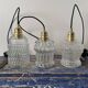Set of three vintage electrified glass pendant lamps