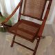 Fauteuil pliant en bambou, cannage, cuir et laiton