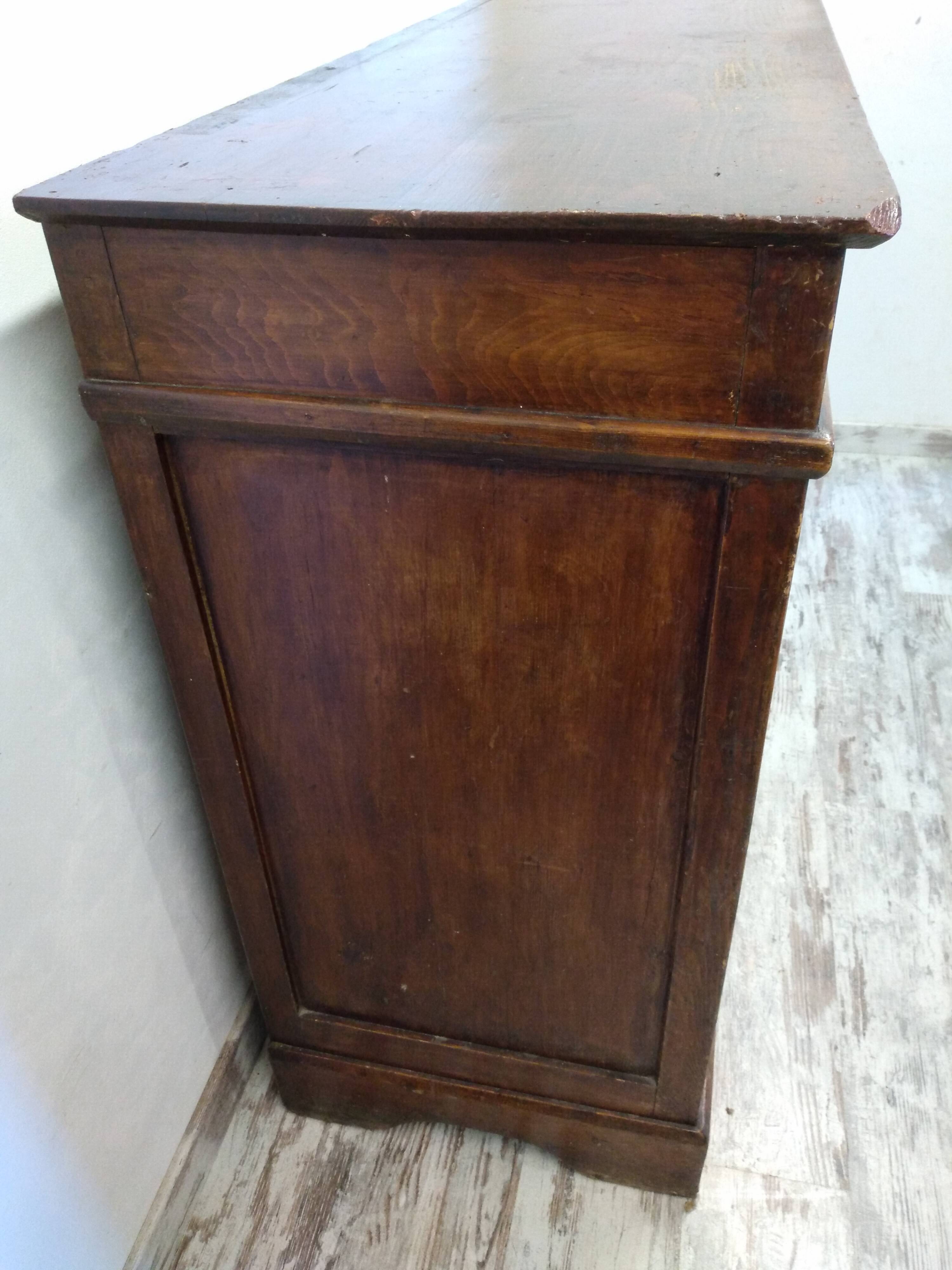 Old low sideboard