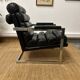 Vintage 1970s black leather armchair – metal frame