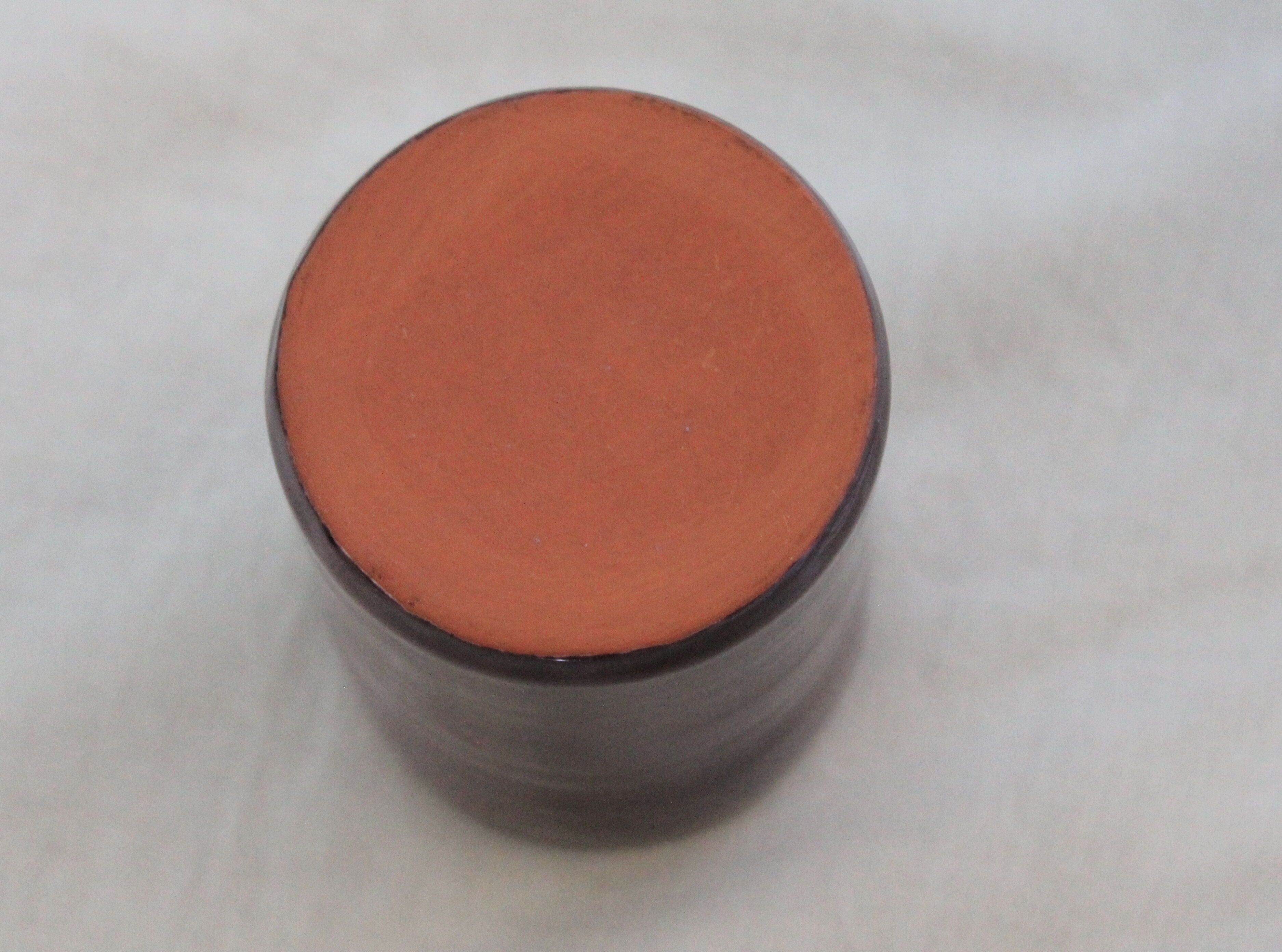 Purple ceramic pitcher and glasses set