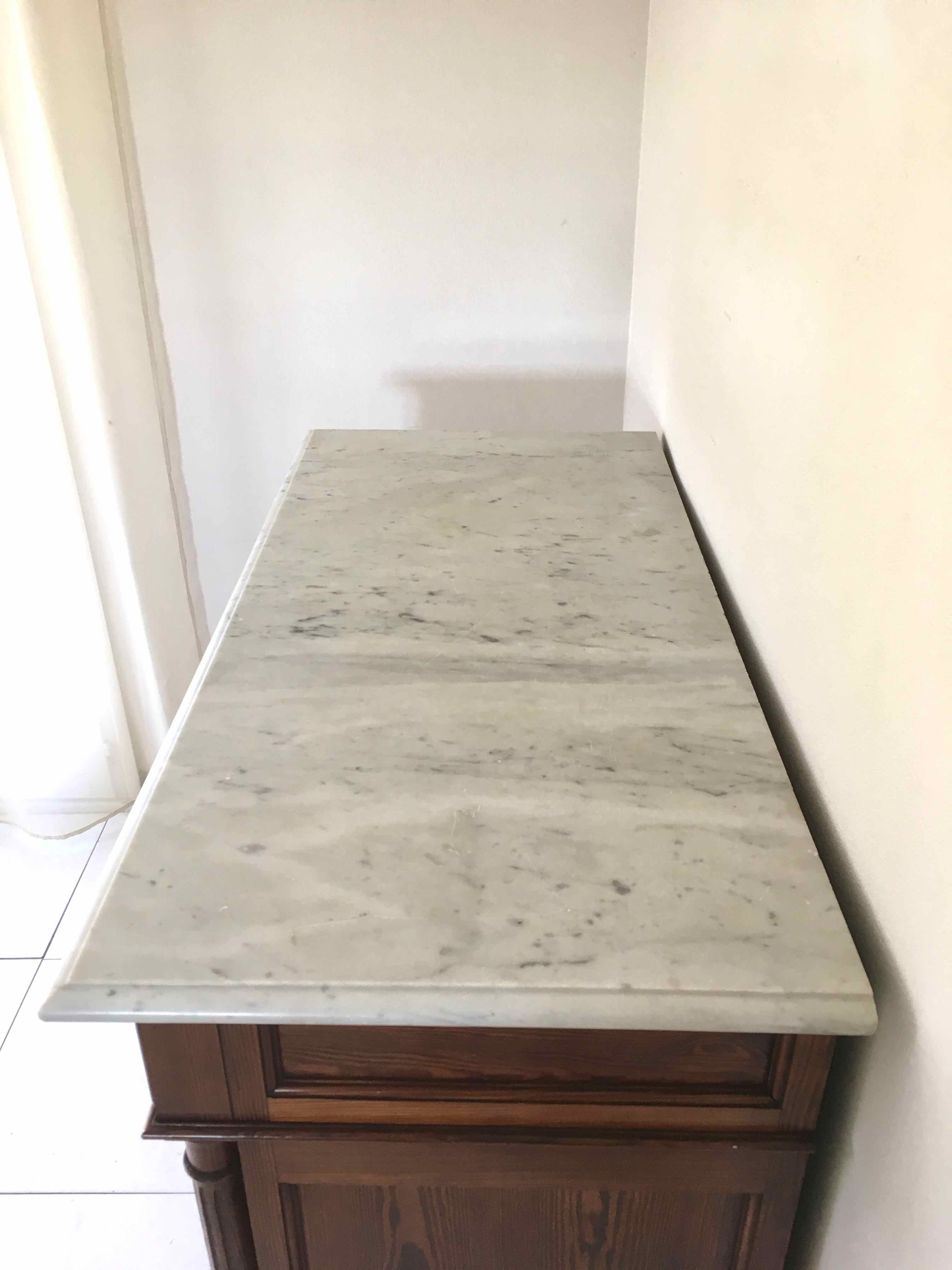 Marble and pitchpin chest of drawers