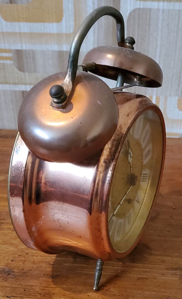 Réveil mécanique en cuivre, 14 cm.