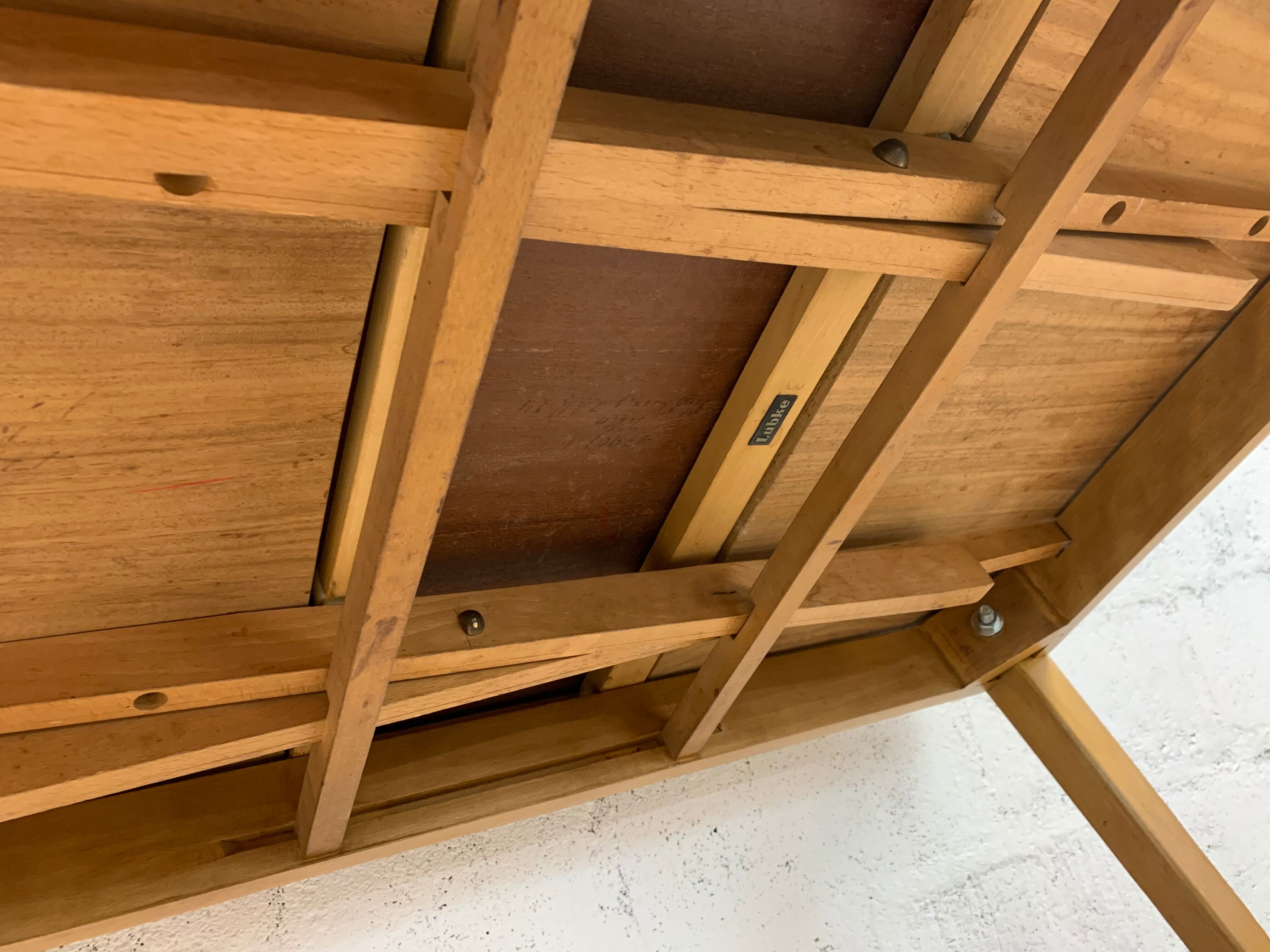 Light-wood dining table by L'bke