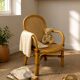 Child's armchair in rattan and caning from the 1960s.