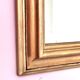 Miroir ancien en bois doré et cuivré