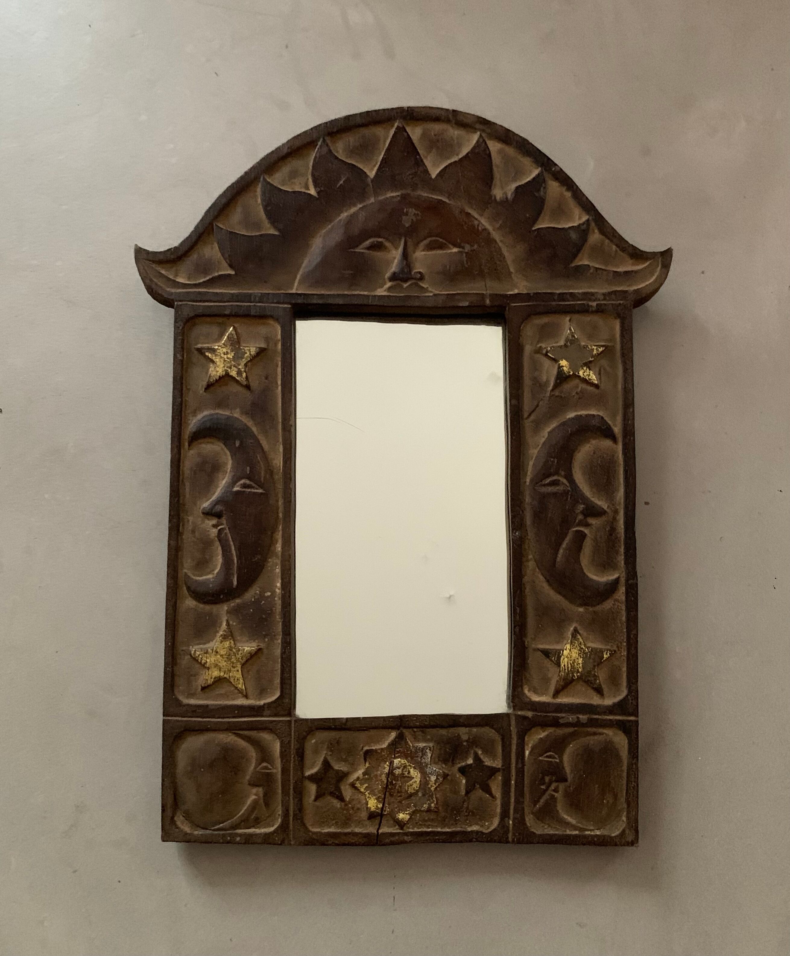 Antique carved wooden mirror