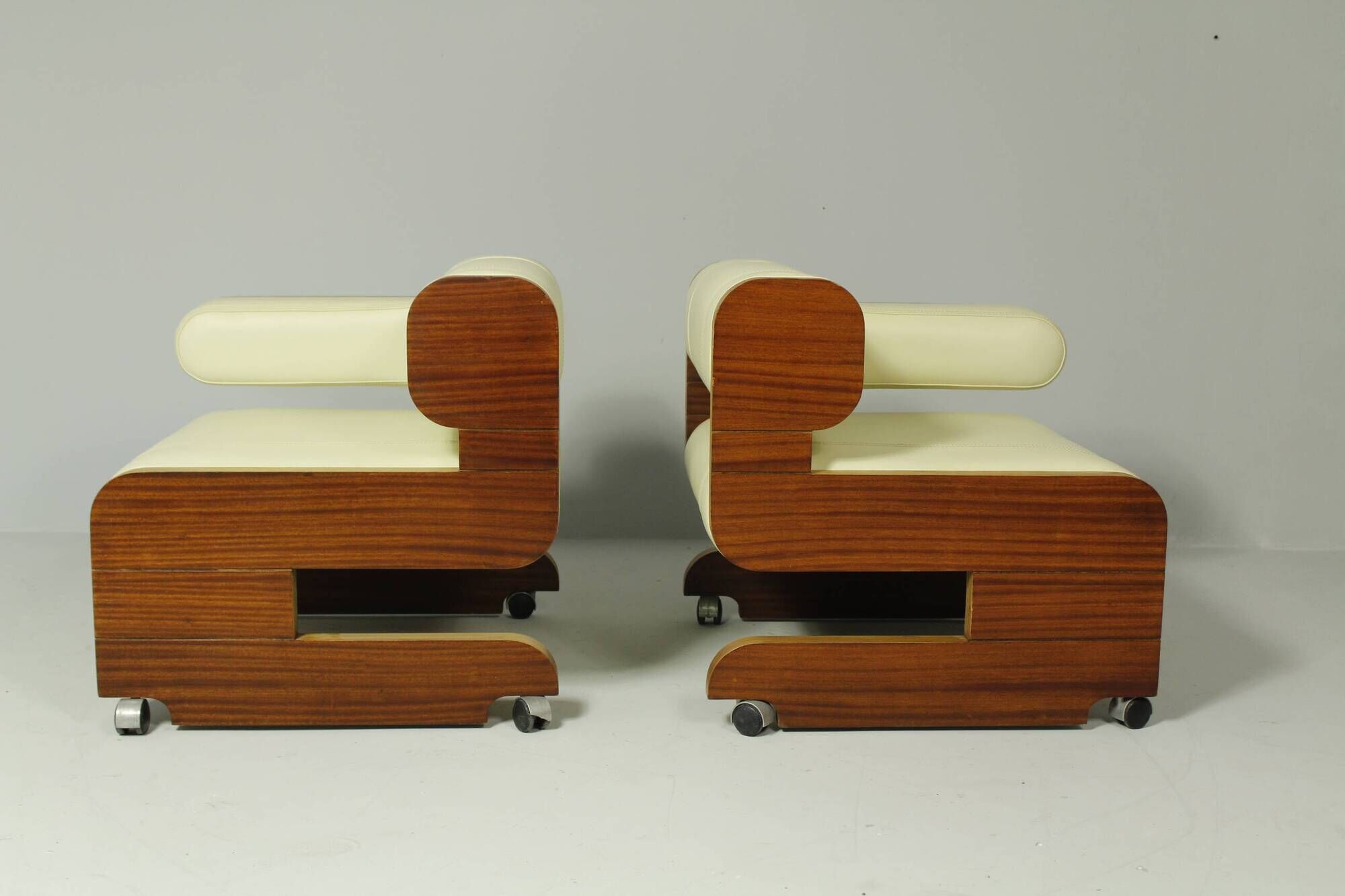 Pair of Mahogany Club Chairs upholstered in leather, 1970s