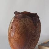 Signed textured terracotta vase