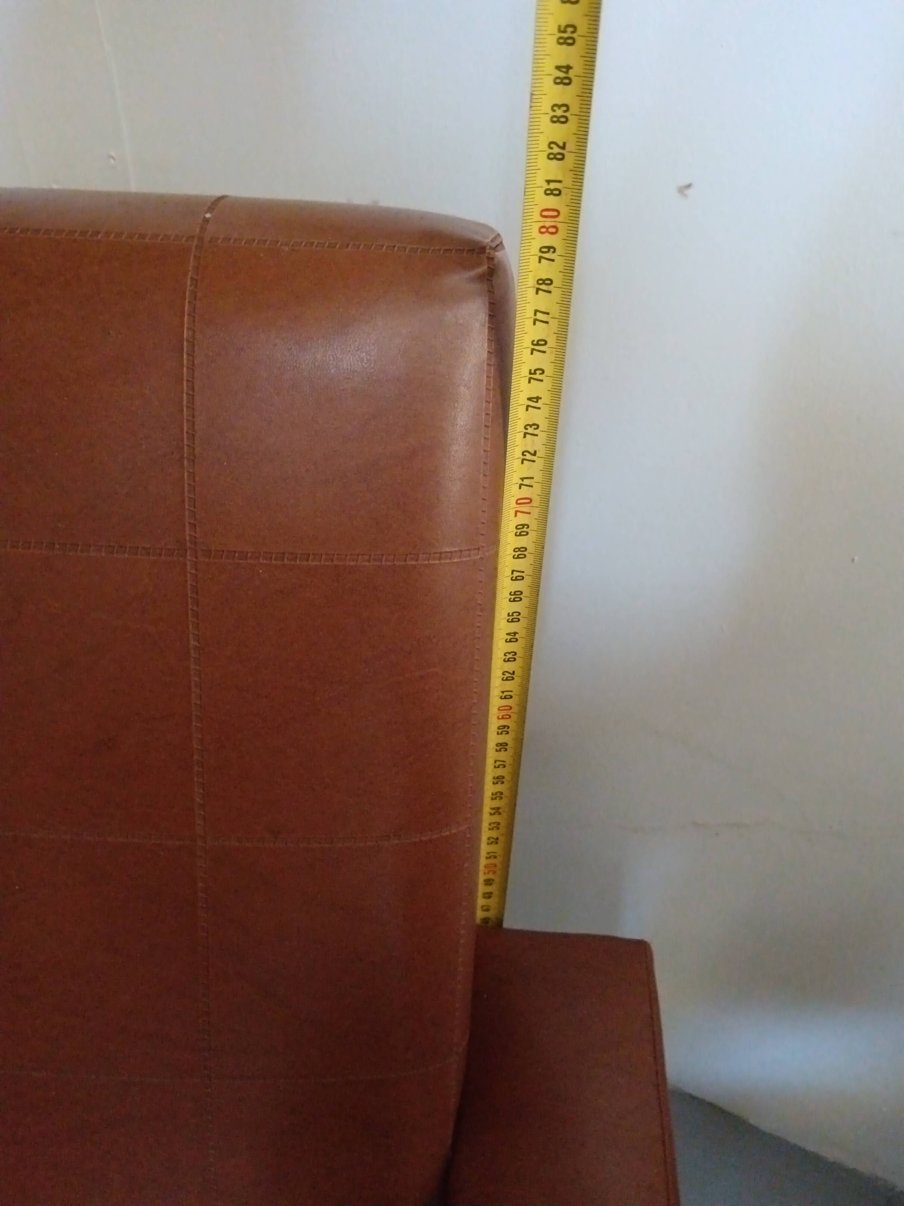 Fauteuil en skaï marron