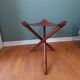 Tabouret pliant en cuir et bois