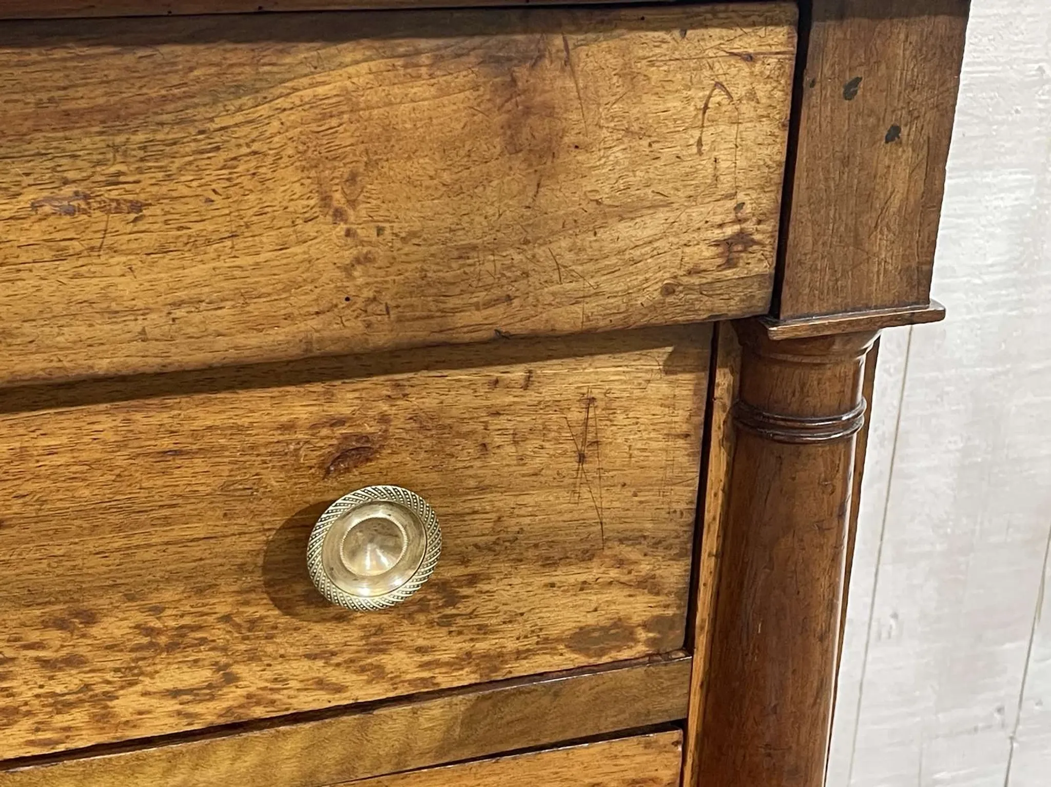 19th-century Empire commode in walnut with a grey St Anne marble top.
