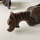 Paire d’appliques dragons ailés en bois sculpté