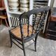Napoleon III chair in black and gold wood with caning
