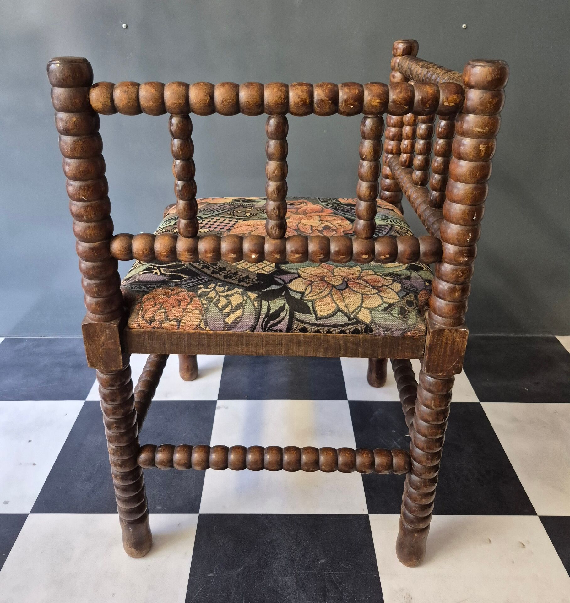 Old pair of corner chairs known as 'fireplace corner' armchairs.