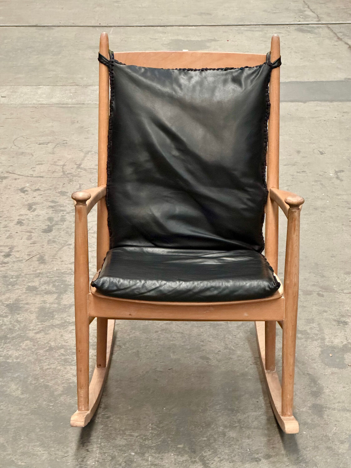 Scandinavian wooden and leather rocking chair