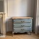 Louis XV style commode with a patina