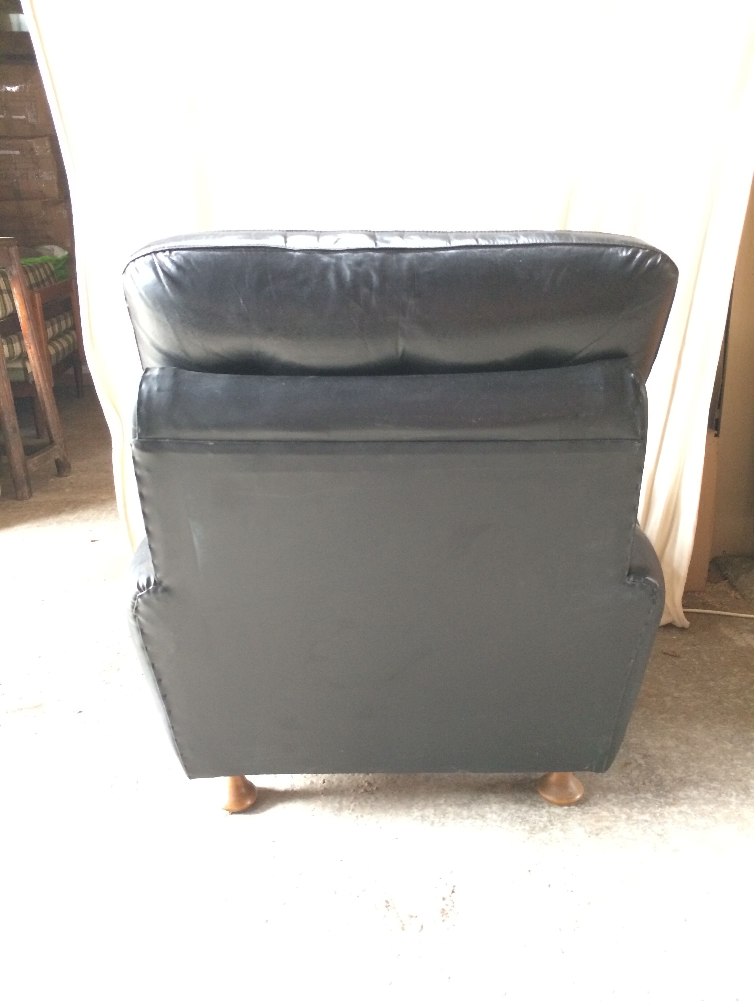 Former black leather chair