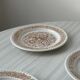 5 orange dessert plates.