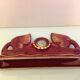 Scout clock in red ceramic bordeaux art deco style