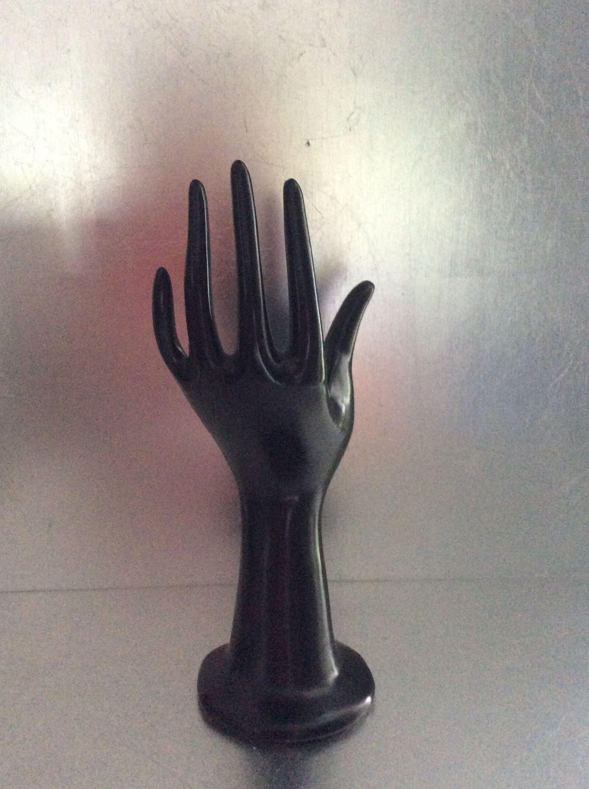 Vintage black ceramic hand