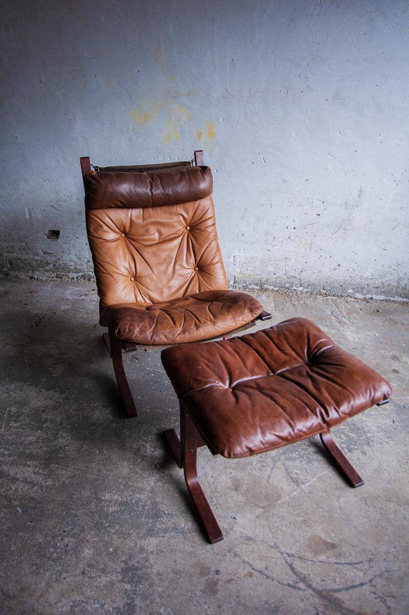 Siesta armchair by Ingmar Relling with ottoman — bentwood dark brown frame, cognac leather