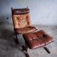 Siesta armchair by Ingmar Relling with ottoman — bentwood dark brown frame, cognac leather