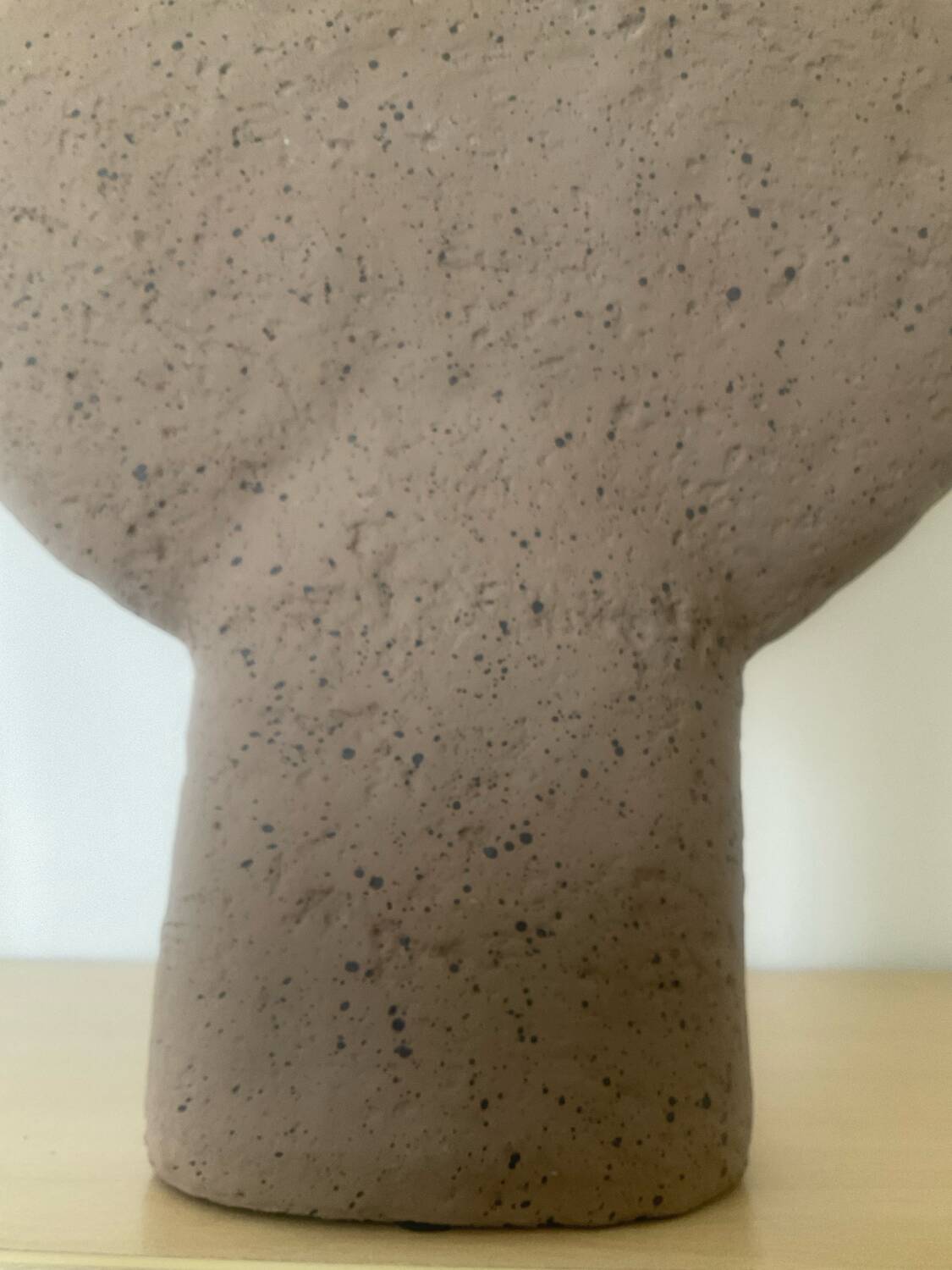 Vintage vase made of raw clay