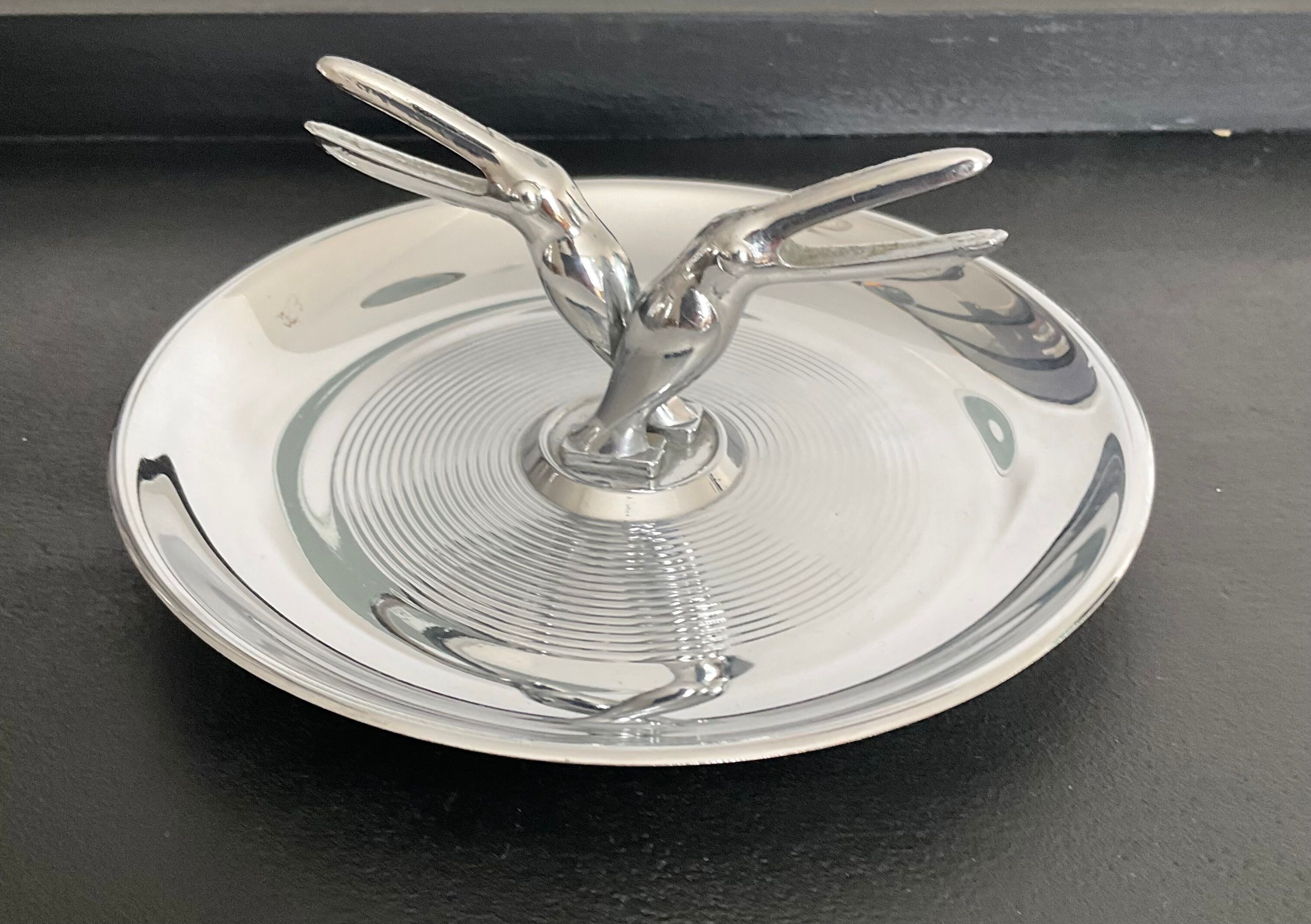 Empty vintage pelican pocket in silver metal USA