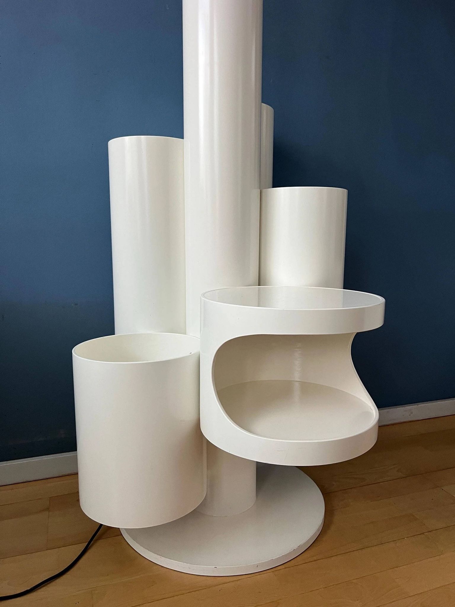 White floor lamp "Close Encounter" and plant stand by Kerst Koopman