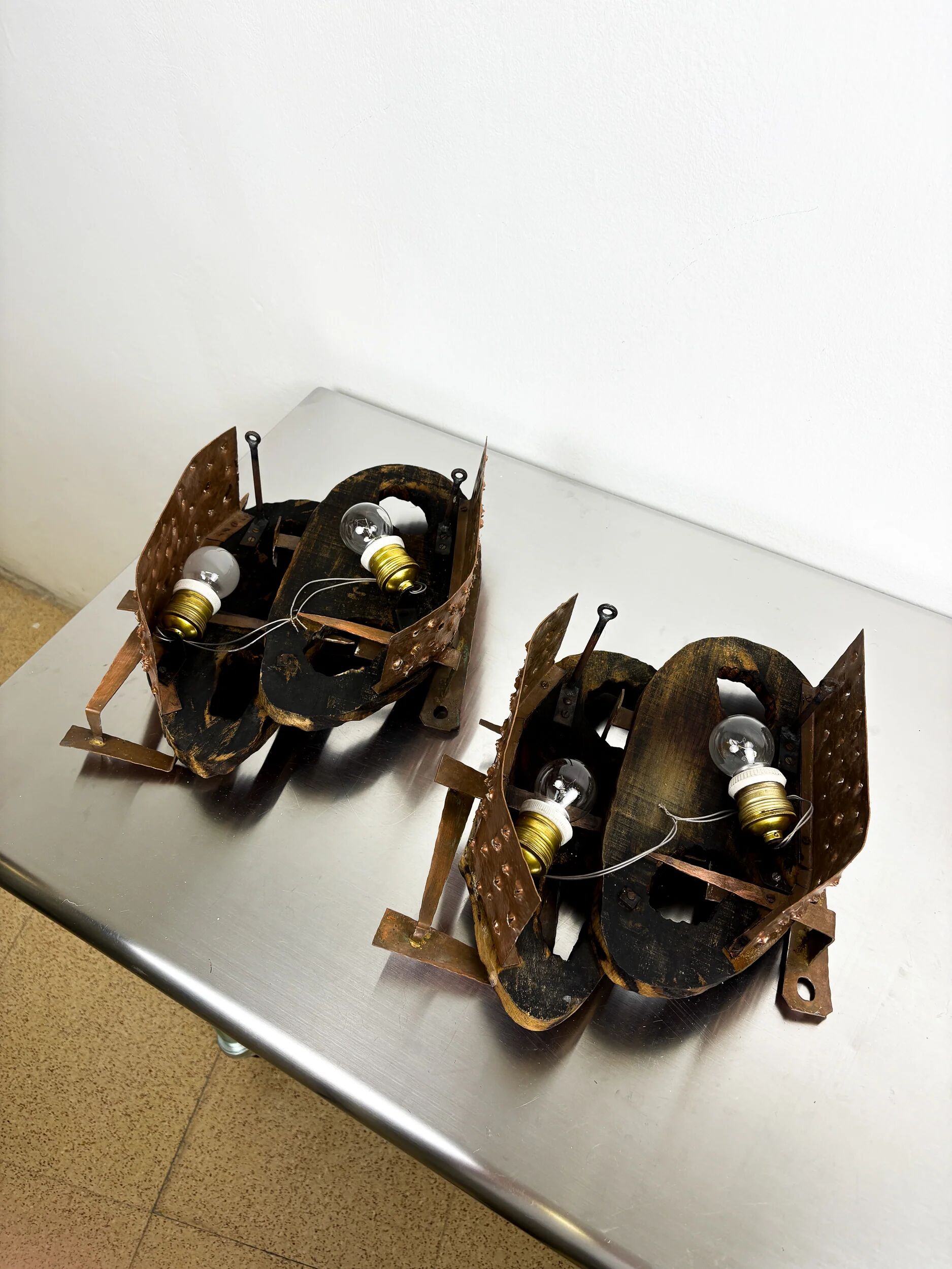 Pair of Brutalist wood & copper wall sconces, Italy, 1970s