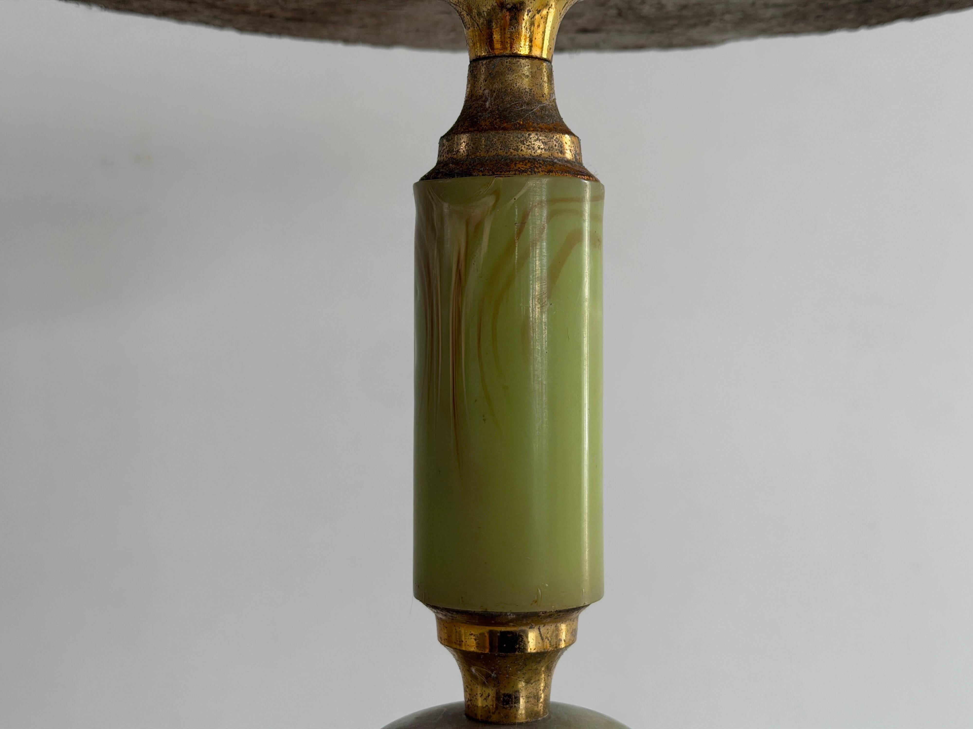Mid-century side table in green marble with a brass base, 1960s, Italy.