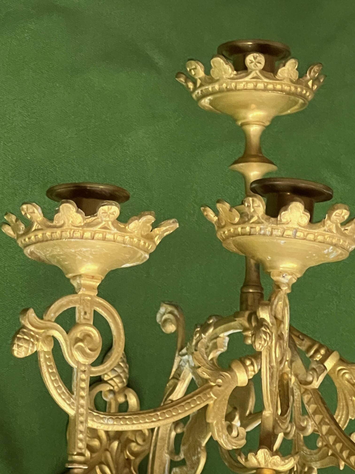 Pair of neo-Gothic wall sconces. Solid gilt bronze.