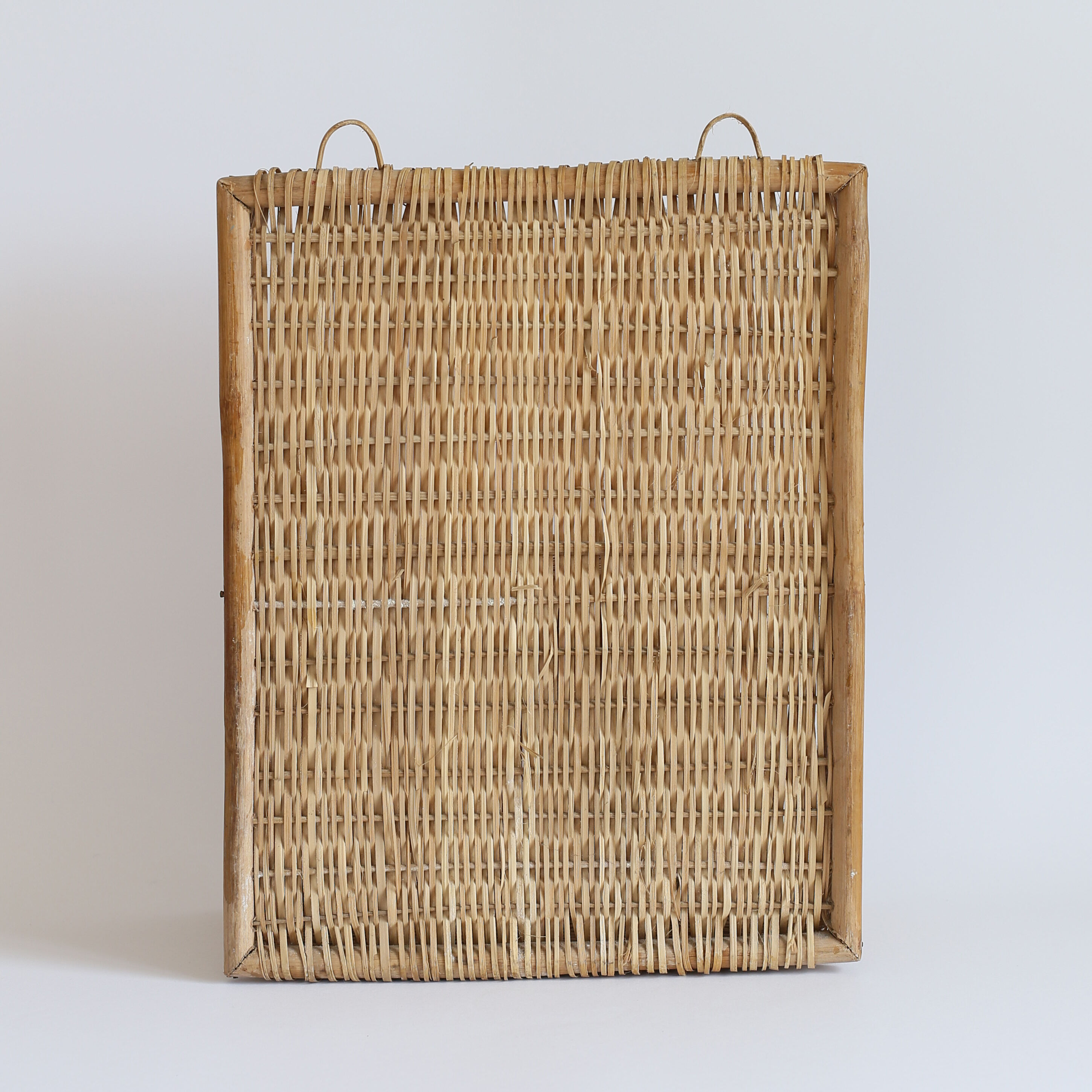 Rattan wall shelf