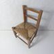 Old wooden straw chair for children