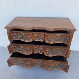 Commode arbalète