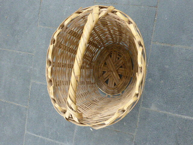 Basket has handles, braided vintage