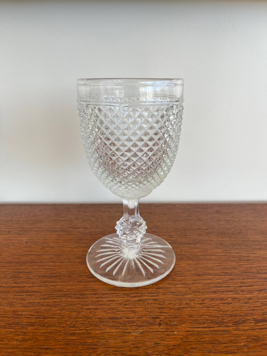 Two 19th-century moulded crystal glasses with diamond points.