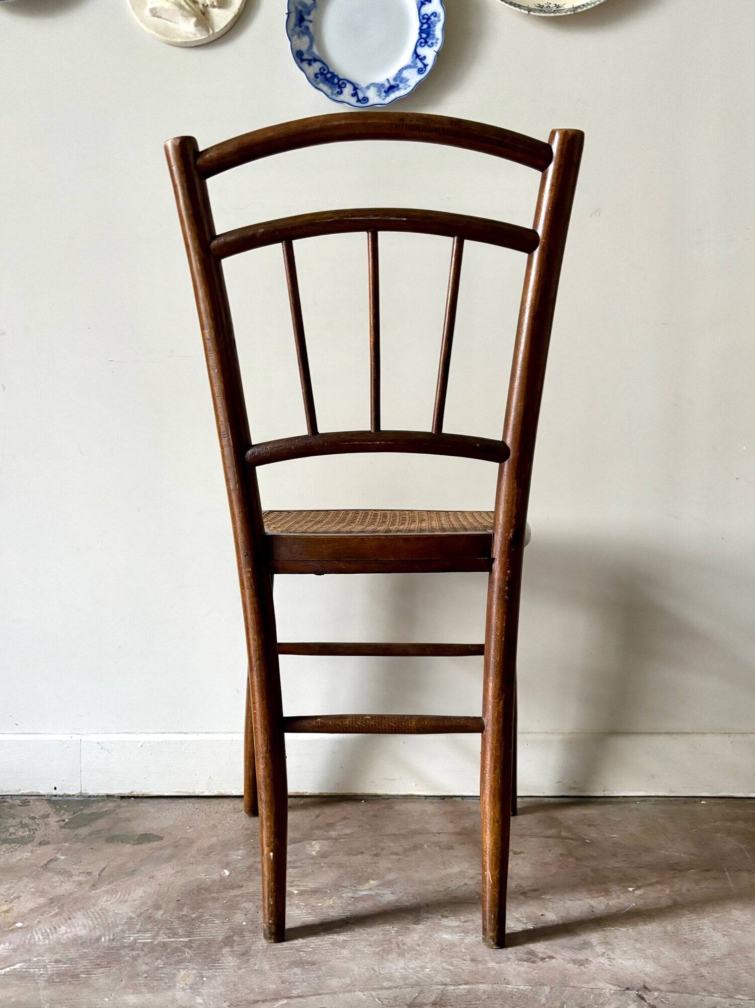 Wooden and cane bistro chair